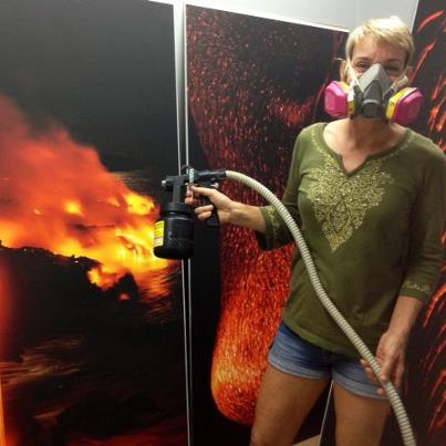 Robbyn in the spray booth at Hilo Fine Art Center
